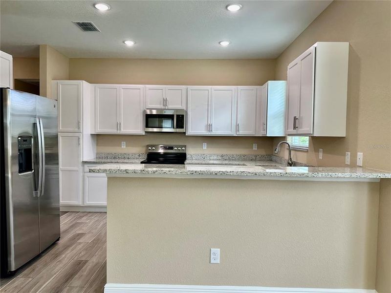 Furnished interior view inside a new home in , Weeki Wachee (Image 35).