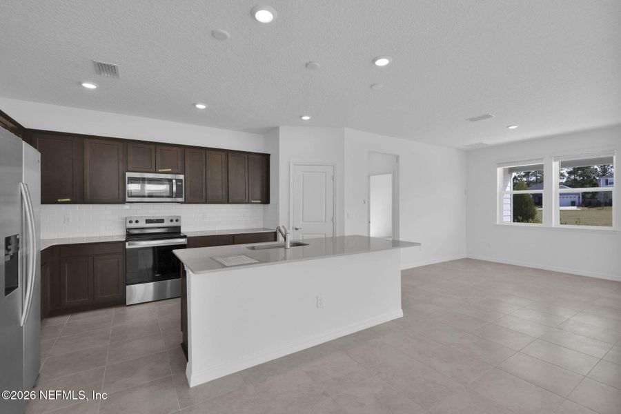 Furnished interior view inside a new home in Hyland Trail, Green Cove Springs (Image 5). Furnished interior view inside a new home in Hyland Trail, Green Cove Springs (Image 5).