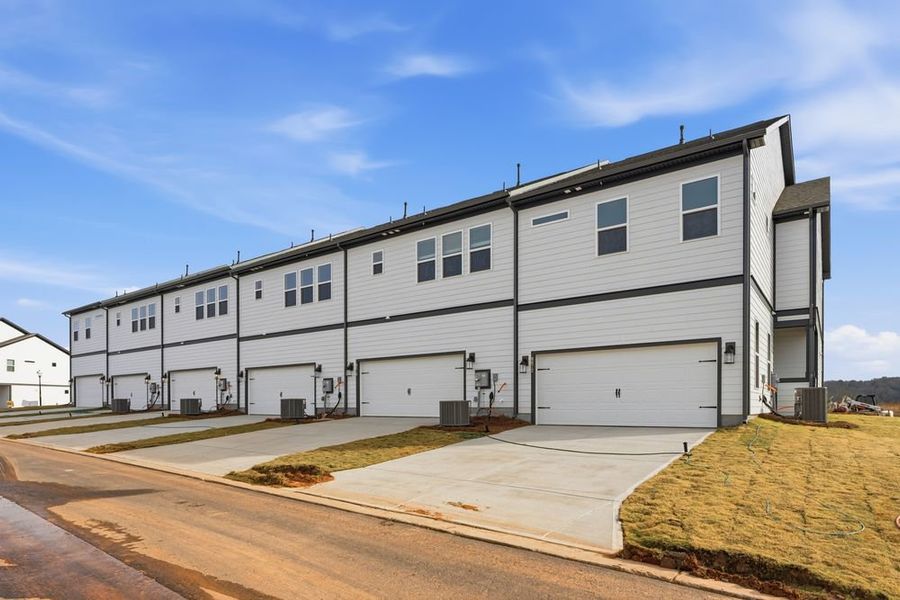 Front exterior of a new home in Ridge at Sugar Creek, Indian Land, SC, highlighting curb appeal (Image 14).