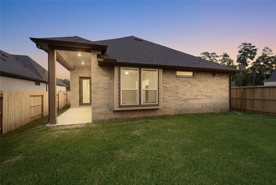 The covered patio features high ceilings and recessed lighting, perfect for year-round outdoor entertainment. The covered patio features high ceilings and recessed lighting, perfect for year-round outdoor entertainment.