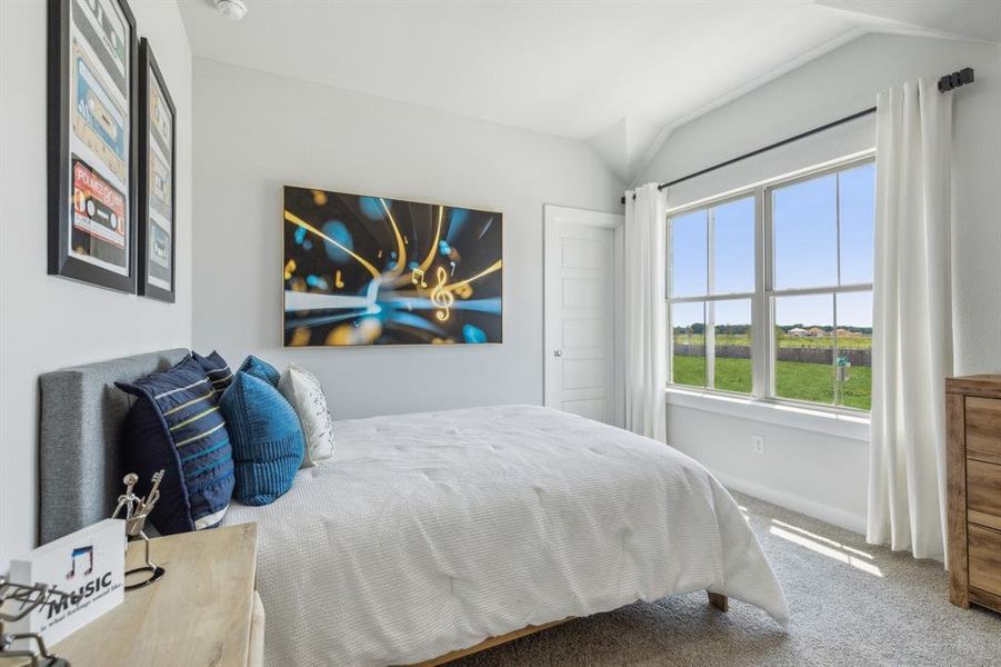 Bedroom in the Winters home plan by Trophy Signature Homes  REPRESENTATIVE PHOTO