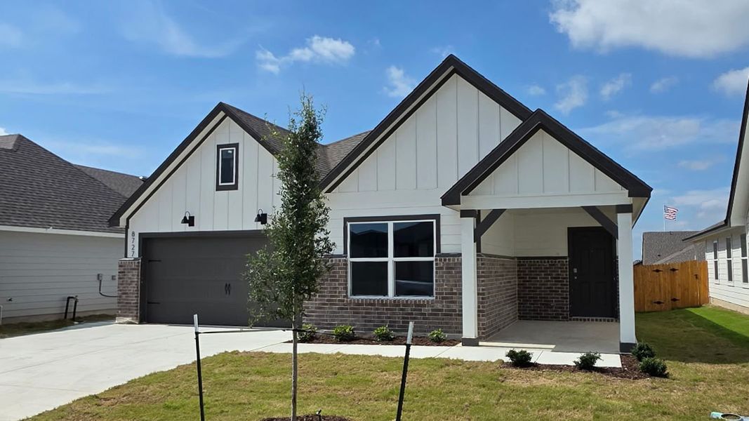 Front exterior of a new home in Mesa Ridge, Temple, TX, highlighting curb appeal (Image 2). Front exterior of a new home in Mesa Ridge, Temple, TX, highlighting curb appeal (Image 2).