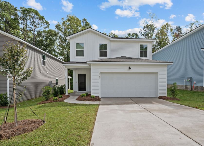 Front exterior of a home in the Grand Arbor community, located in Blythewood, SC (Image 14).
