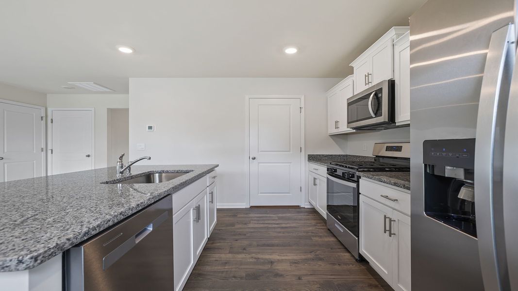 Furnished interior view inside a new home in Treemont Commons, Wellford (Image 7).