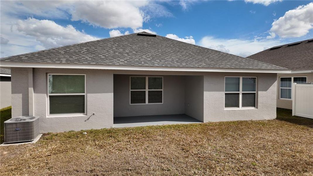 Exterior details and patio area of a home in Pine Bluff, Spring Hill (Image 26).