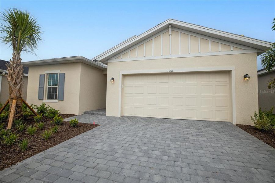 Front exterior of a new home in , Punta Gorda, FL, highlighting curb appeal (Image 1). Front exterior of a new home in , Punta Gorda, FL, highlighting curb appeal (Image 1).