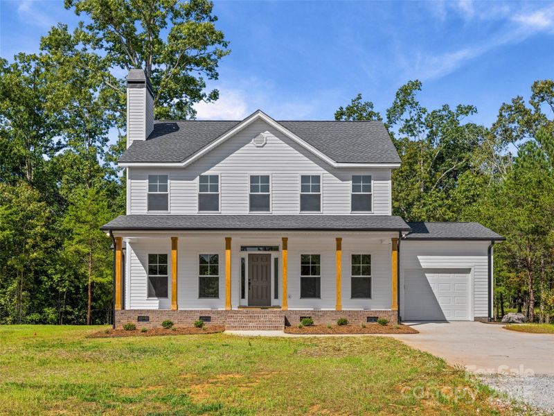 Front exterior of a new home in , Smyrna, SC, highlighting curb appeal (Image 24).