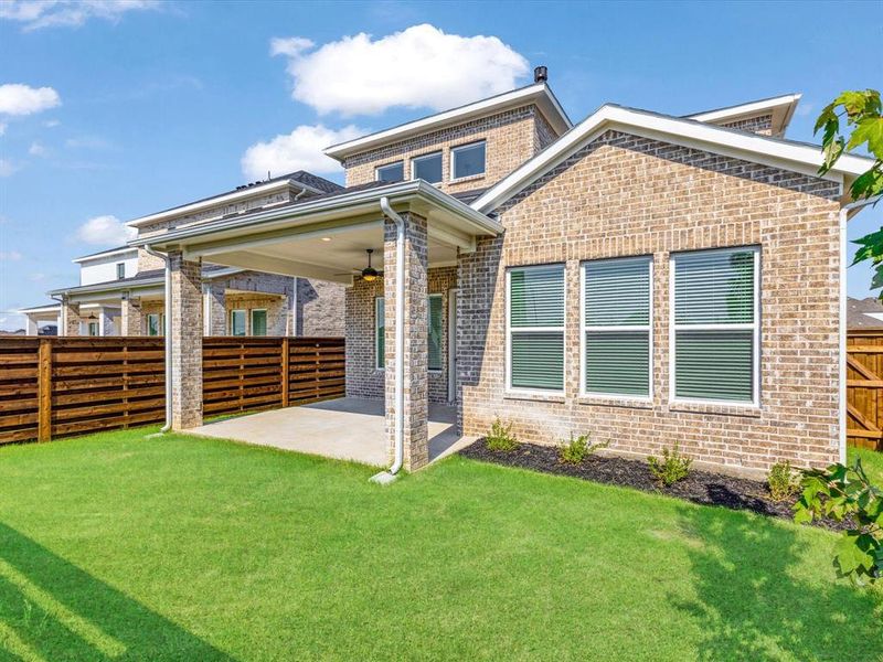 Front exterior of a new home in Royal Court, Little Elm, TX, highlighting curb appeal (Image 21).
