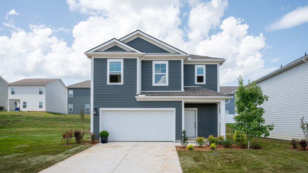 Blue exterior with 2-car garage Blue exterior with 2-car garage
