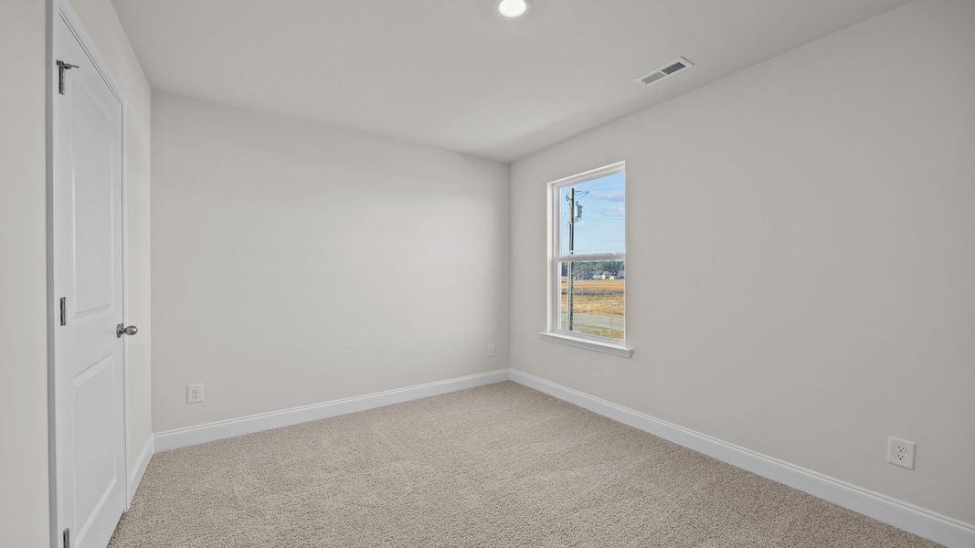 Spacious, unfurnished interior of a new home in Beaver Dam Crossing, Bailey (Image 31). Spacious, unfurnished interior of a new home in Beaver Dam Crossing, Bailey (Image 31).