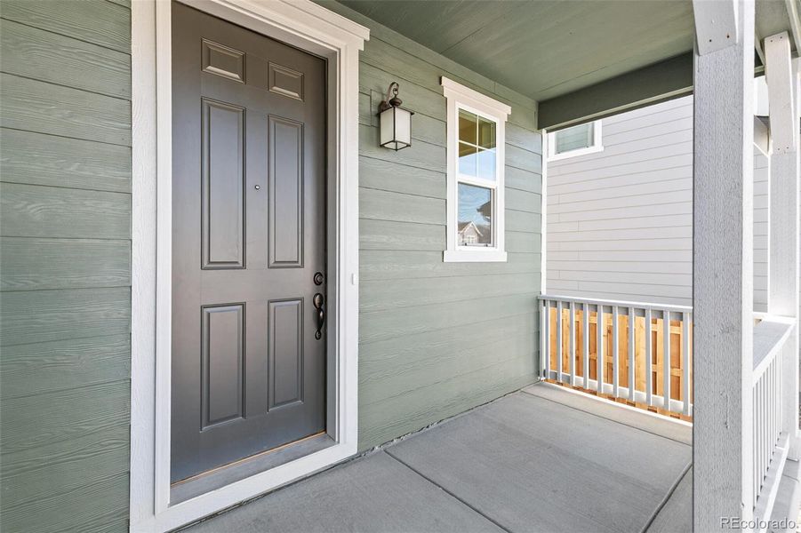 Exterior details and patio area of a home in Turnberry, Commerce City (Image 3).