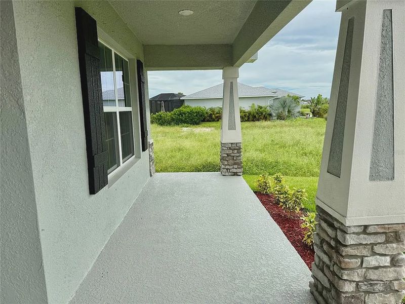 Exterior details and patio area of a home in South Gulf Cove, Port Charlotte (Image 15).
