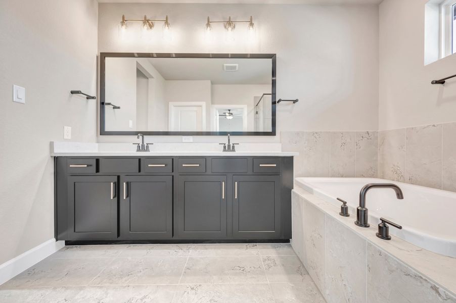 Furnished interior view inside a new home in Pomona - Grove Row Collection, Manvel (Image 15).