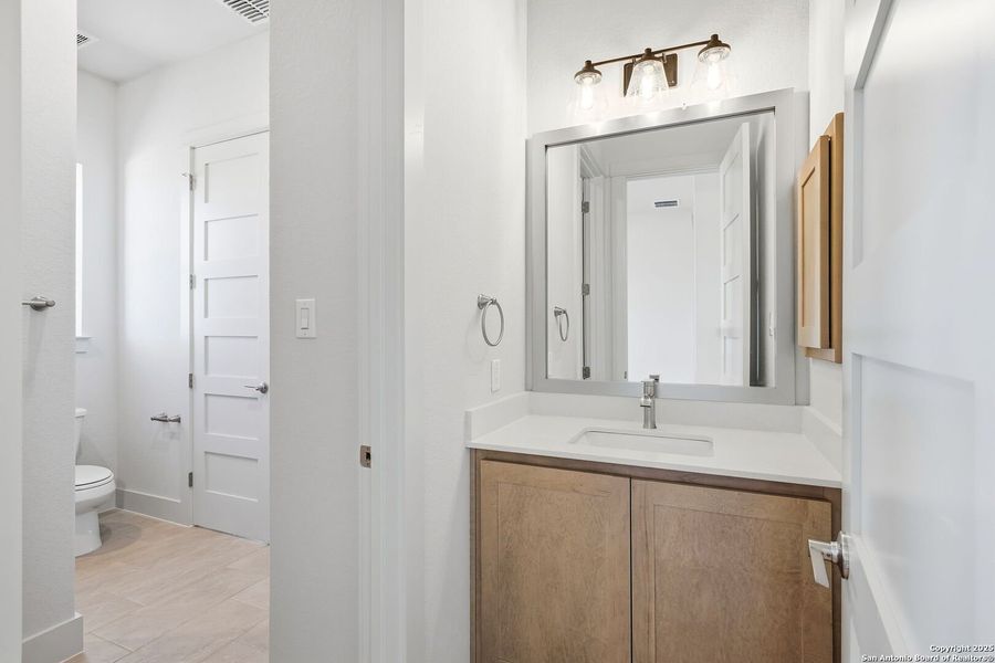 Furnished interior view inside a new home in Pradera Ridge, Floresville (Image 8).