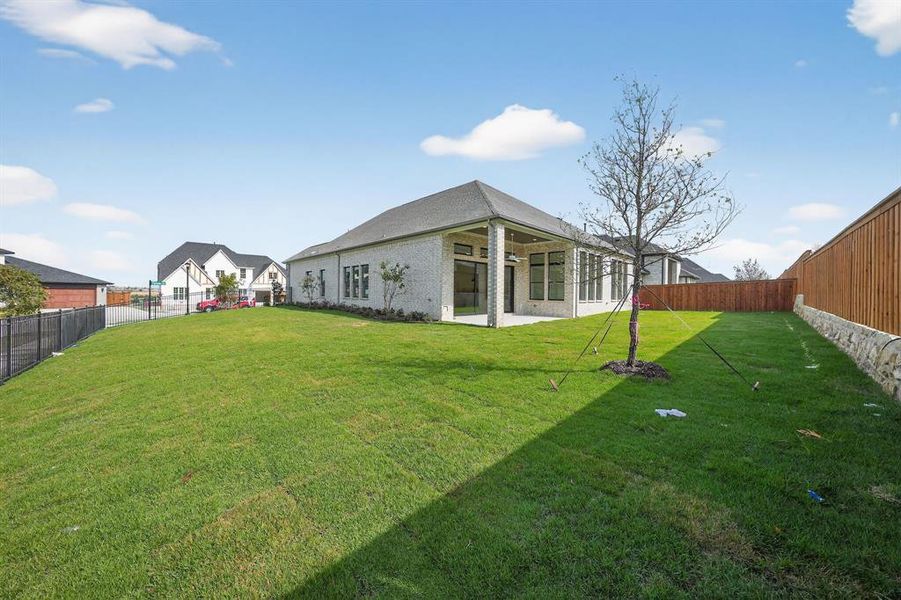 Exterior details and patio area of a home in Walsh Ranch, Fort Worth (Image 3).