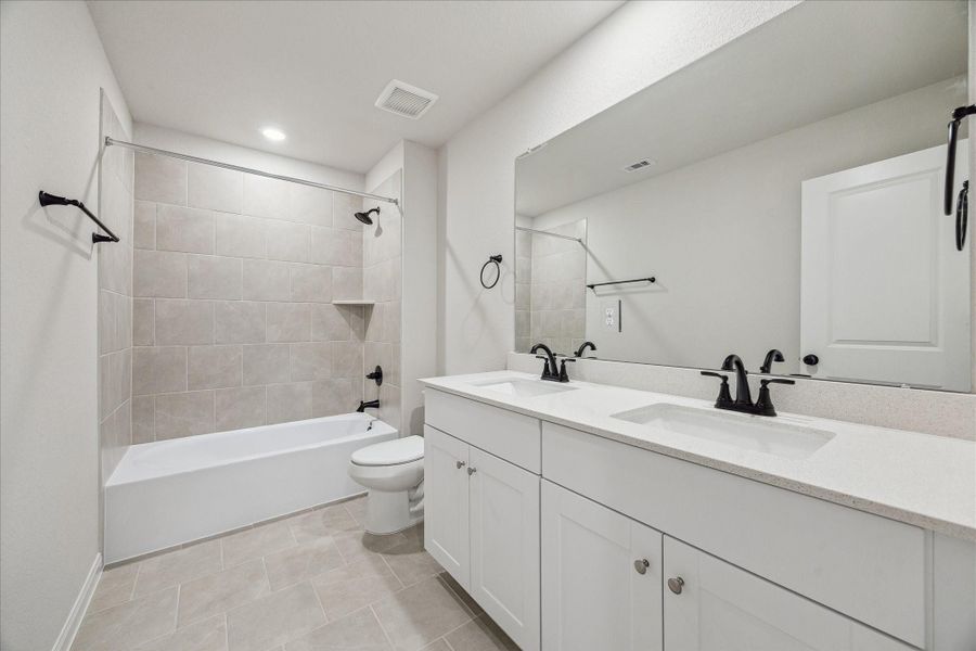Furnished interior view inside a new home in Elyson, Katy (Image 11).