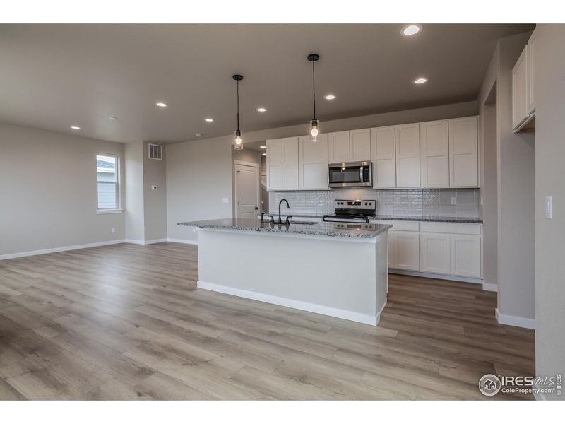 Furnished interior view inside a new home in Promontory Point, Greeley (Image 8).