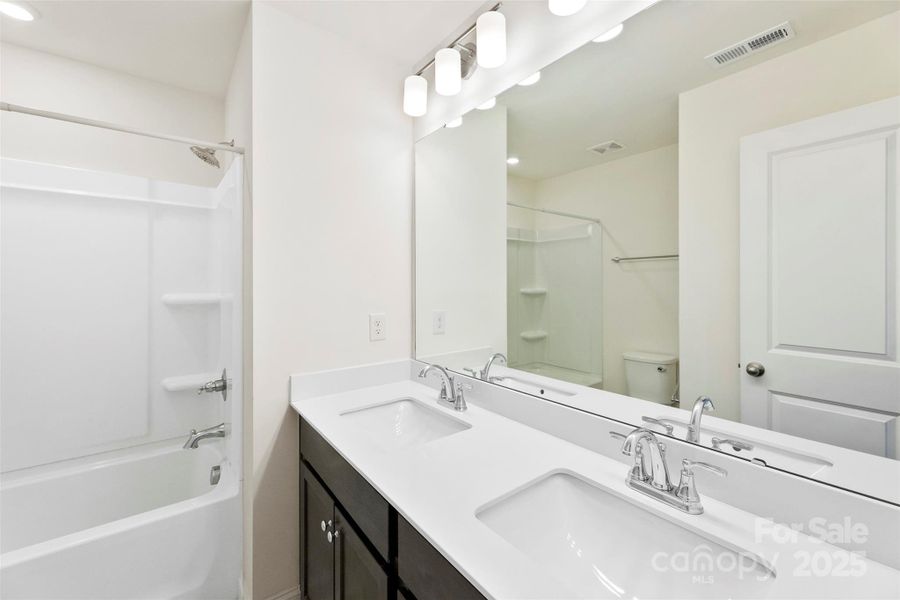 Furnished interior view inside a new home in , Belmont (Image 10).