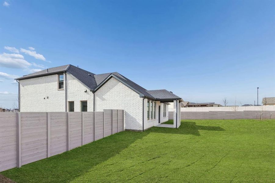 Covered Patio in the Stanley II home plan by Trophy Signature Homes – REPRESENTATIVE PHOTO