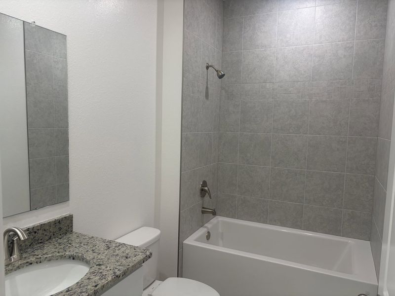 Furnished interior view inside a new home in Burnt Store Village, Punta Gorda (Image 5).