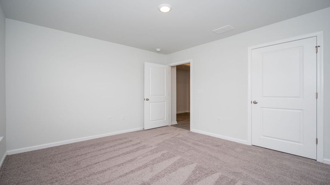 Representative unfurnished interior of a home built from the ARIA by D.R. Horton in The Meadows at Wildwood Village, Shallotte (Image 14). Representative unfurnished interior of a home built from the ARIA by D.R. Horton in The Meadows at Wildwood Village, Shallotte (Image 14).