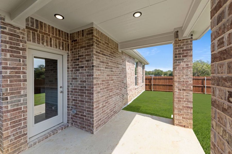 Front exterior of a new home in Keeneland, Aubrey, TX, highlighting curb appeal (Image 28).