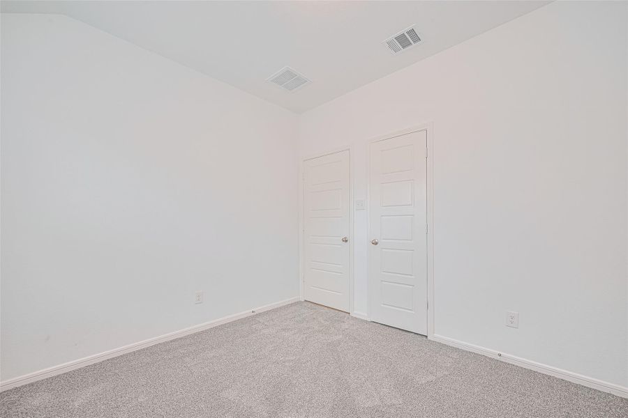 Spacious, unfurnished interior of a new home in Sunterra, Katy (Image 28).