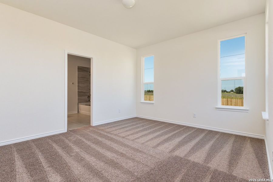 Spacious, unfurnished interior of a new home in Woodside Farms, Seguin (Image 12).