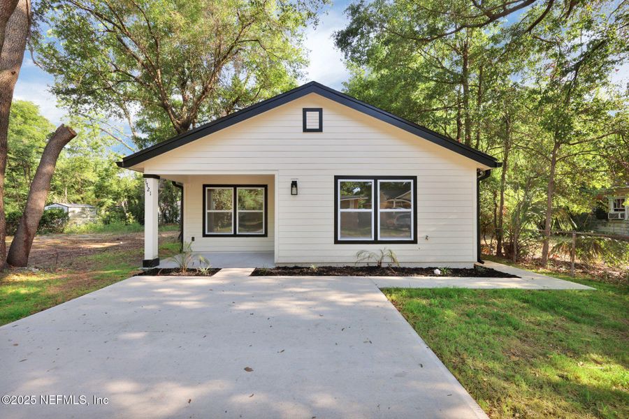 Front exterior of a new home in , Jacksonville, FL, highlighting curb appeal (Image 1). Front exterior of a new home in , Jacksonville, FL, highlighting curb appeal (Image 1).