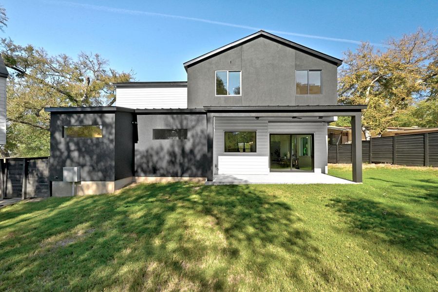 Rear view of house featuring a patio and Private backyard with plenty of space for a pool plus completely fenced backyard Rear view of house featuring a patio and Private backyard with plenty of space for a pool plus completely fenced backyard