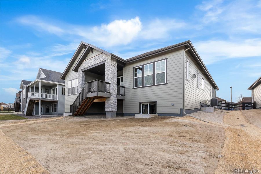 Exterior details and patio area of a home in Hilltop at Inspiration, Aurora (Image 3).