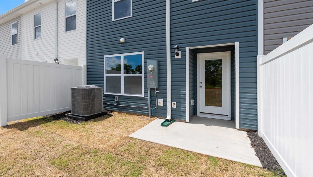 Front exterior of a new home in Covington Village, Greer, SC, highlighting curb appeal (Image 2).