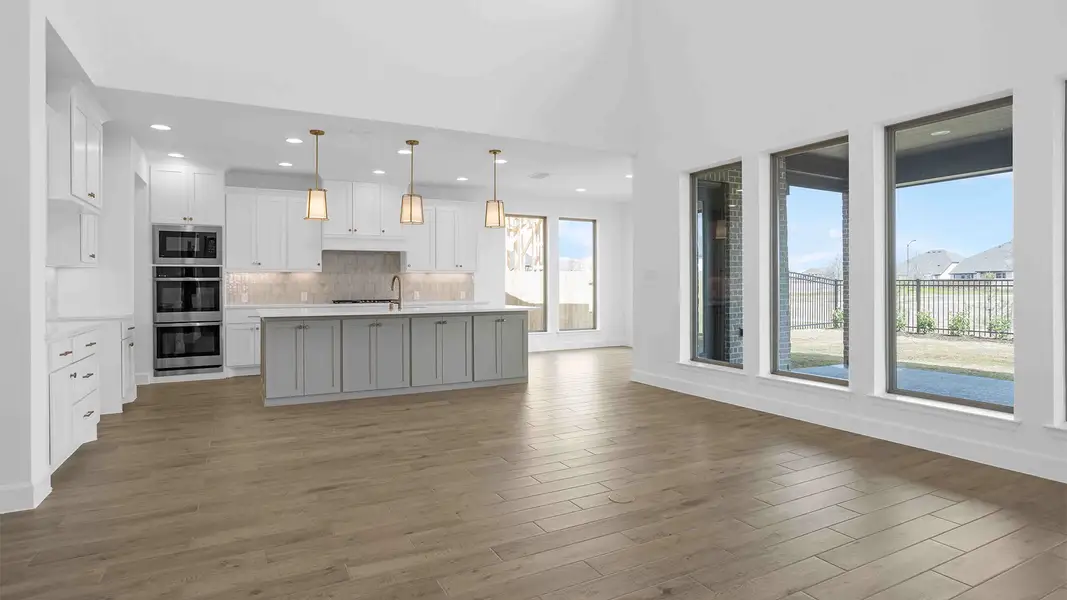 Representative unfurnished interior of a home built from the 3896W by Perry Homes in Terraces, Rockwall (Image 5).