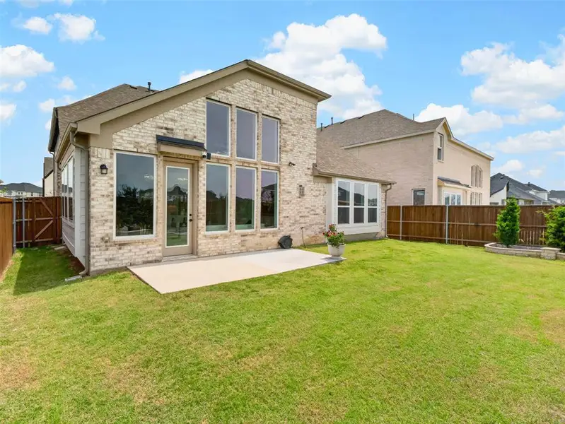Exterior details and patio area of a home in , Wylie (Image 22).