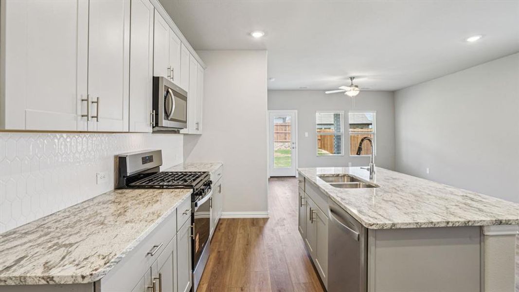 Photo is not of the actual home, but is an inspirational photo of builder’s model home and may depict options, furnishings, and/or decorator features that are not included.