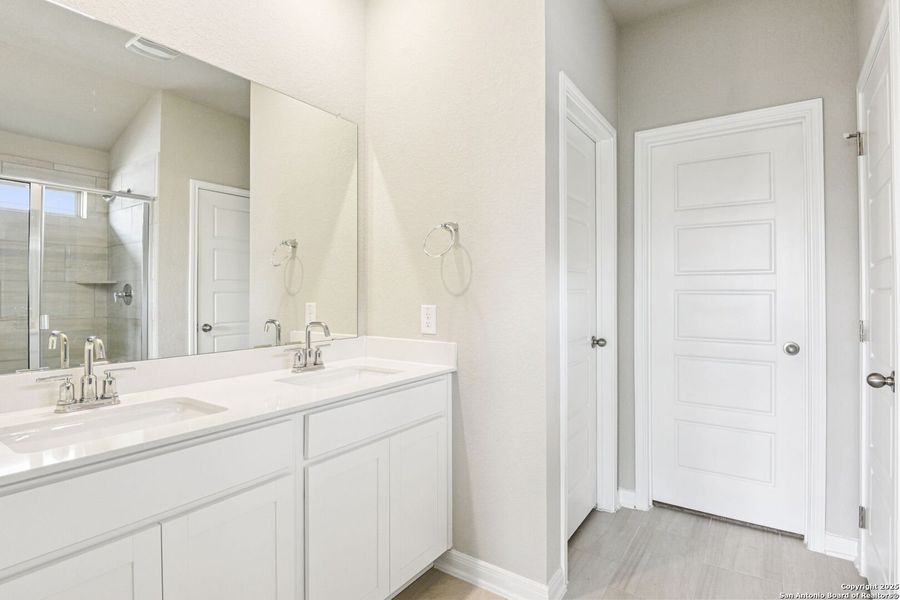 Furnished interior view inside a new home in Legendary Trails - Premier Series, Cibolo (Image 10). Furnished interior view inside a new home in Legendary Trails - Premier Series, Cibolo (Image 10).