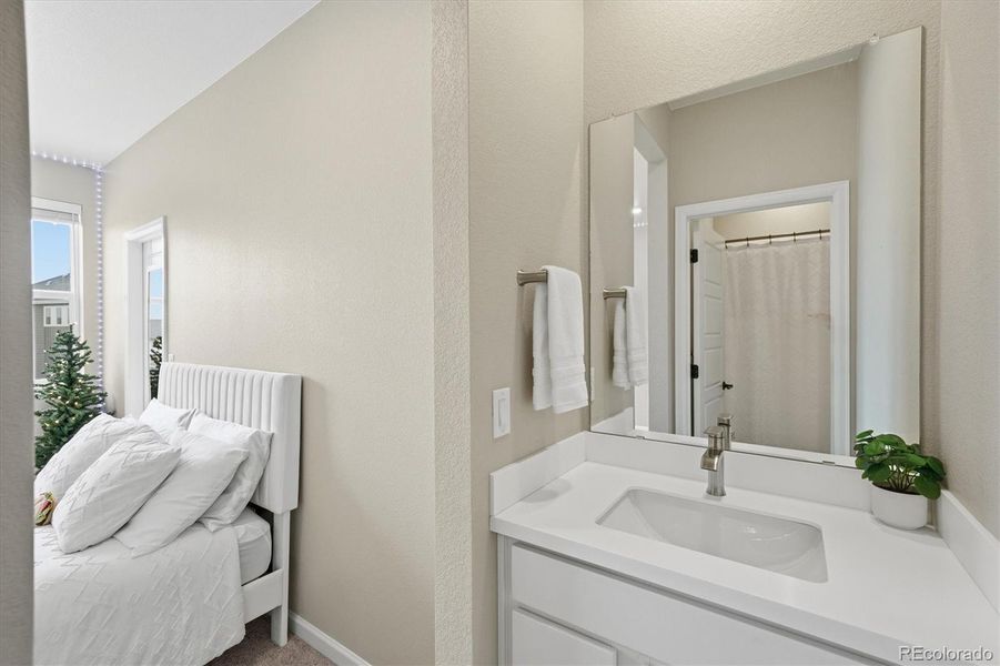 Jack and Jill bathroom connected to bedroom #3.