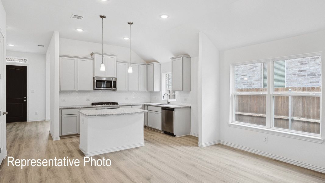 Furnished interior view inside a new home in Green Meadows Premier, Celina (Image 7).