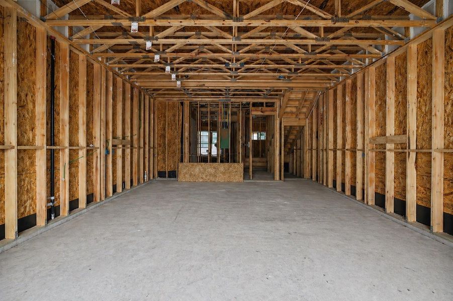 View of the second floor living area from the covered balcony.