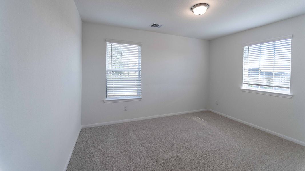 Spacious, unfurnished interior of a new home in The Canopies, Splendora (Image 38).