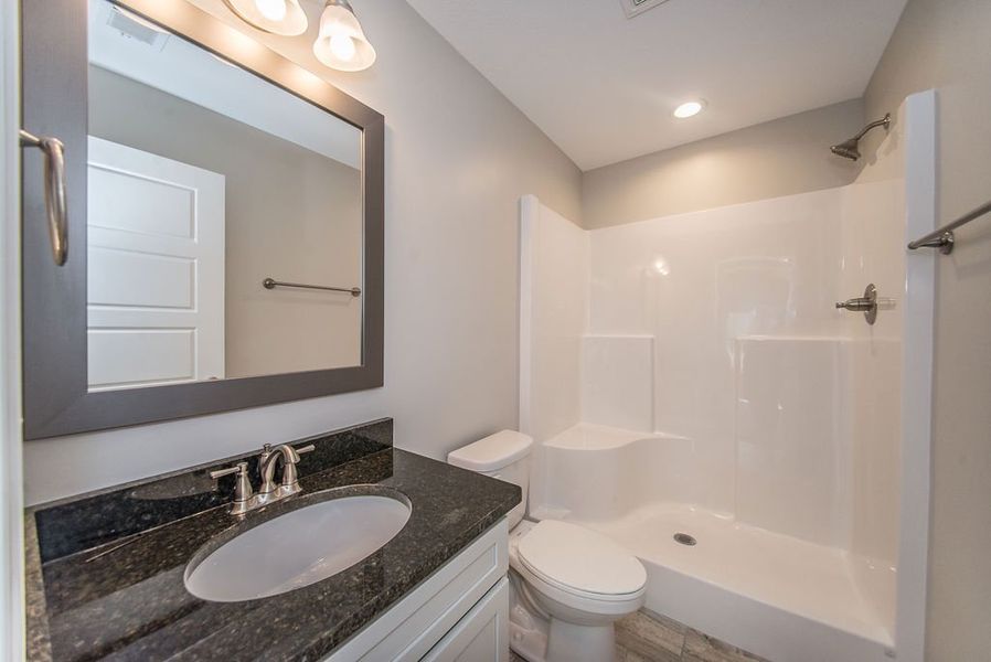 Representative furnished interior of a home built from the Pacific by Enchanted Homes in Hampshire Heights, Moore (Image 29).