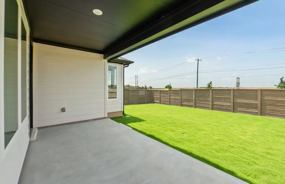 Exterior details and patio area of a home in Kuempel Farms, Pflugerville (Image 24).