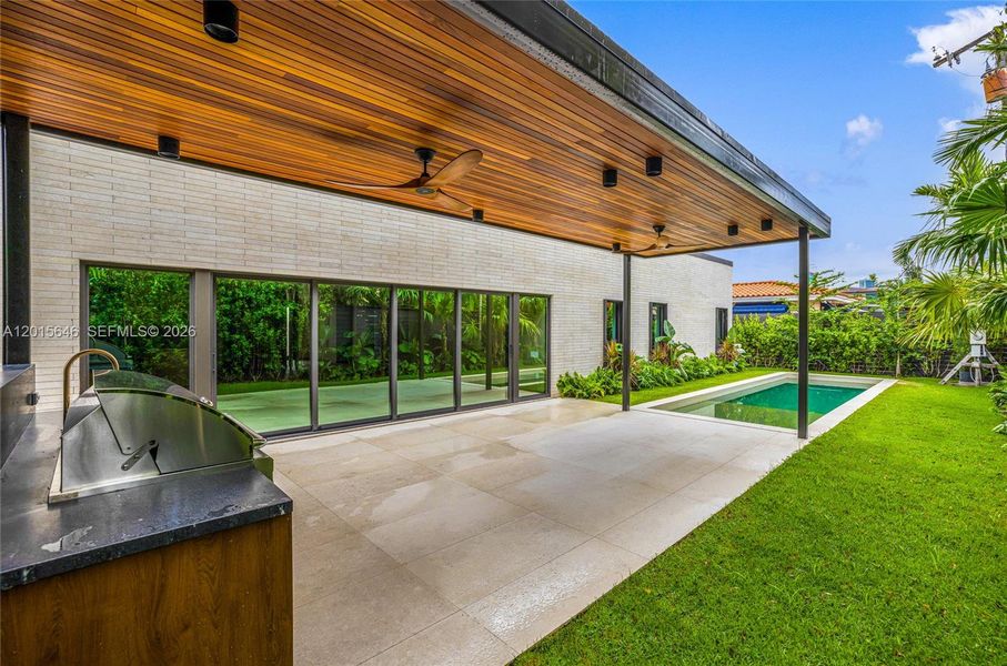 Exterior details and patio area of a home in , Miami (Image 3). Exterior details and patio area of a home in , Miami (Image 3).