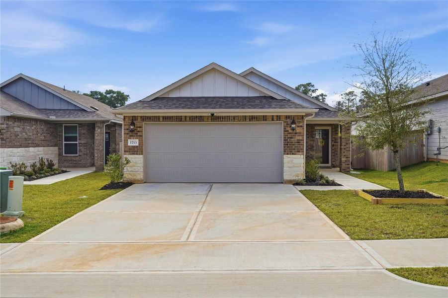 The double-wide driveway offers plenty of space for guest to park.