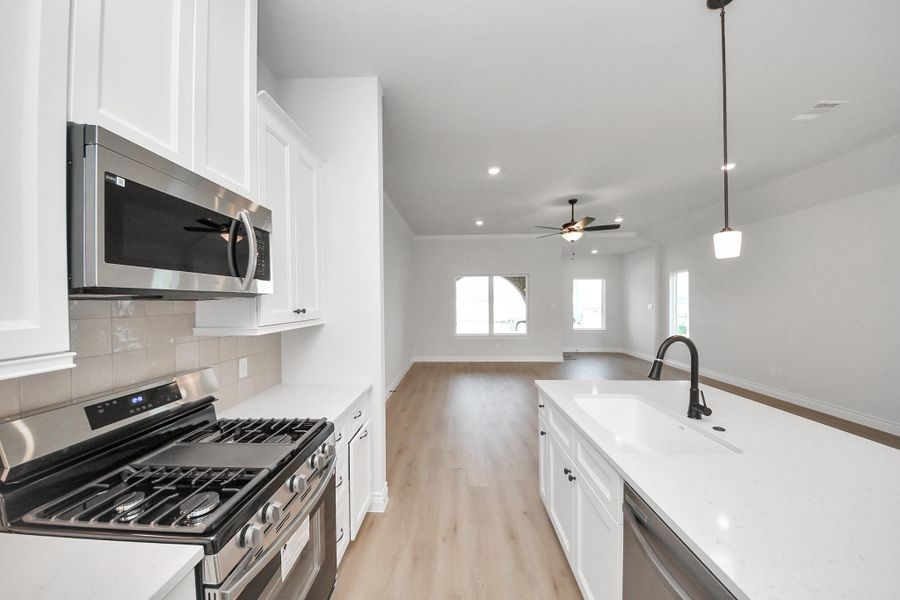 Furnished interior view inside a new home in Lexington Heights, Willis (Image 7). Furnished interior view inside a new home in Lexington Heights, Willis (Image 7).