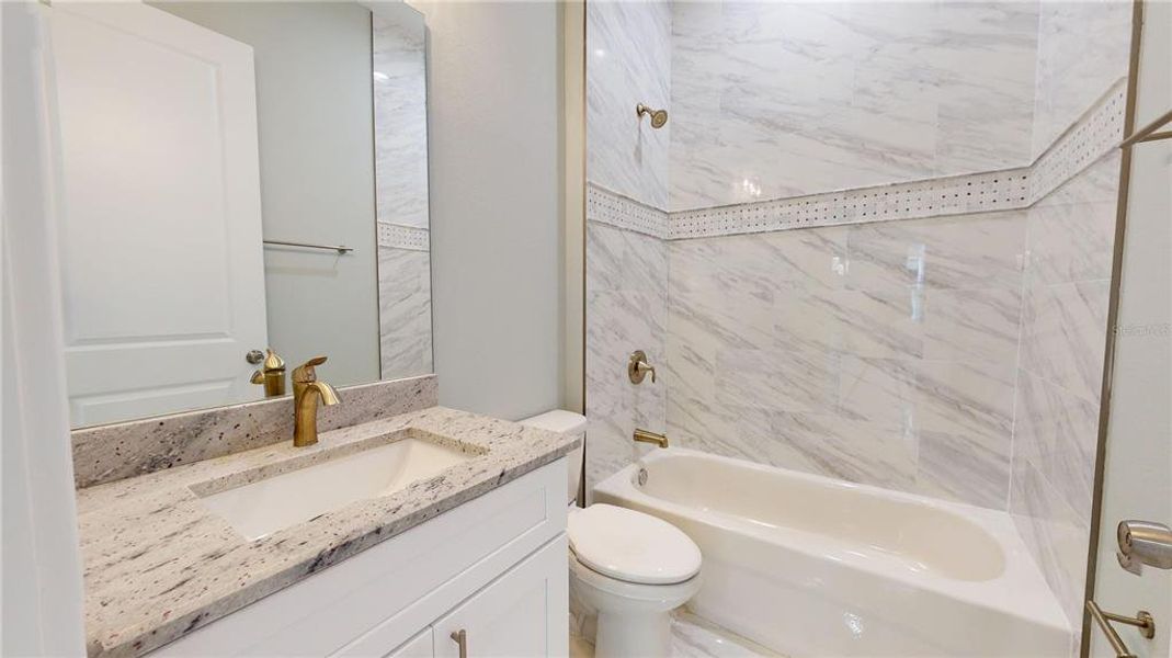 Guest Bath with Gorgeous Tile Work!