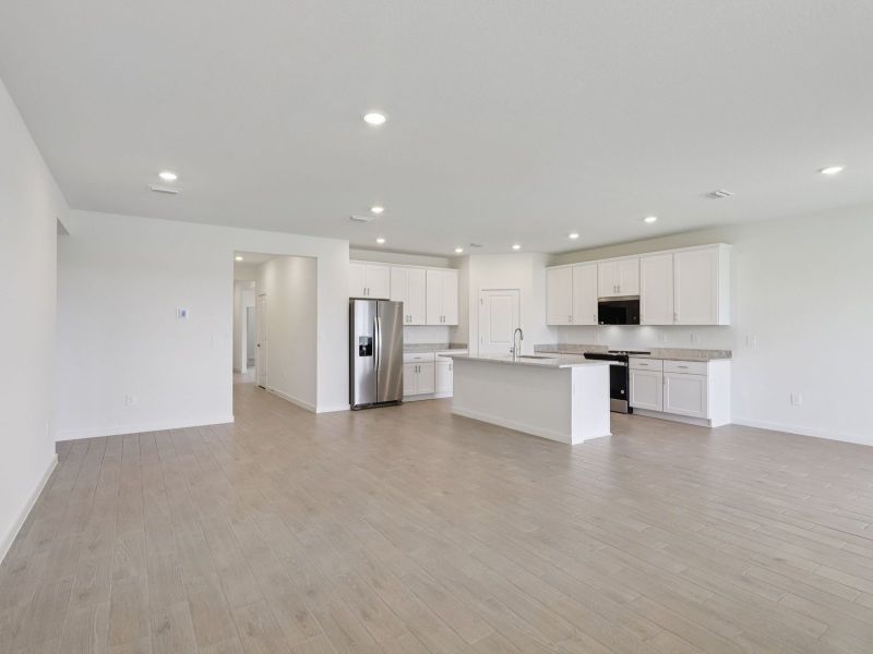 Spacious, unfurnished interior of a new home in Flagler Village - Signature Series, Palm Coast (Image 8).