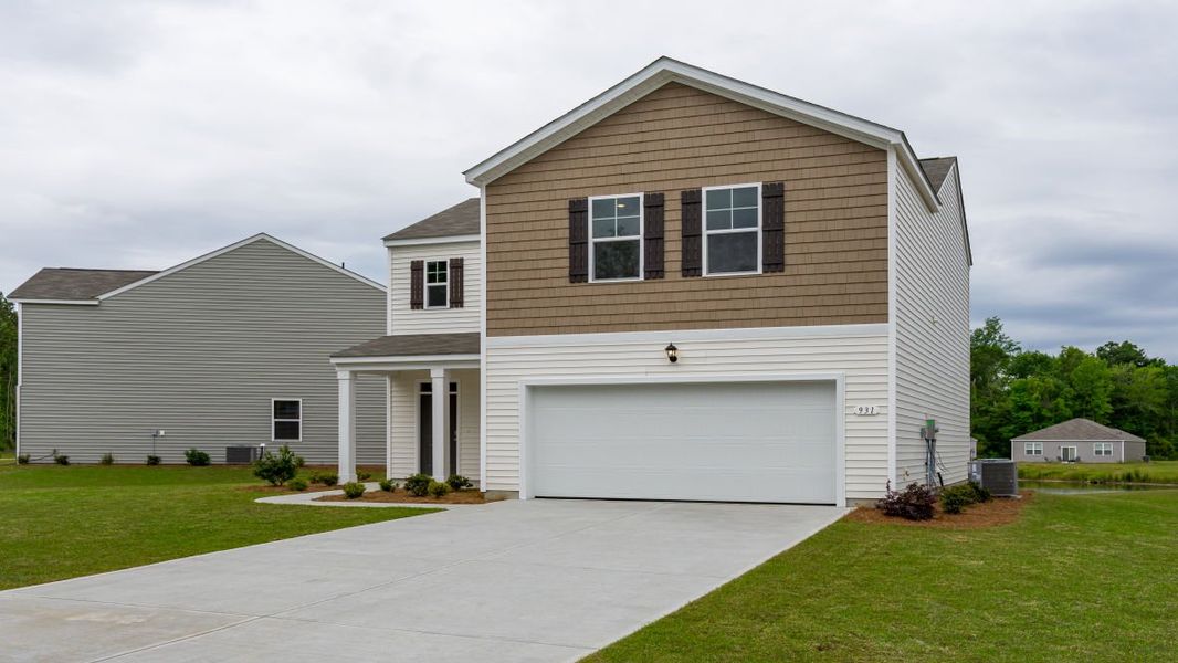 Representative exterior photo of a completed home built from the ARDEN by D.R. Horton in Island Green, Myrtle Beach, SC (Image 19).