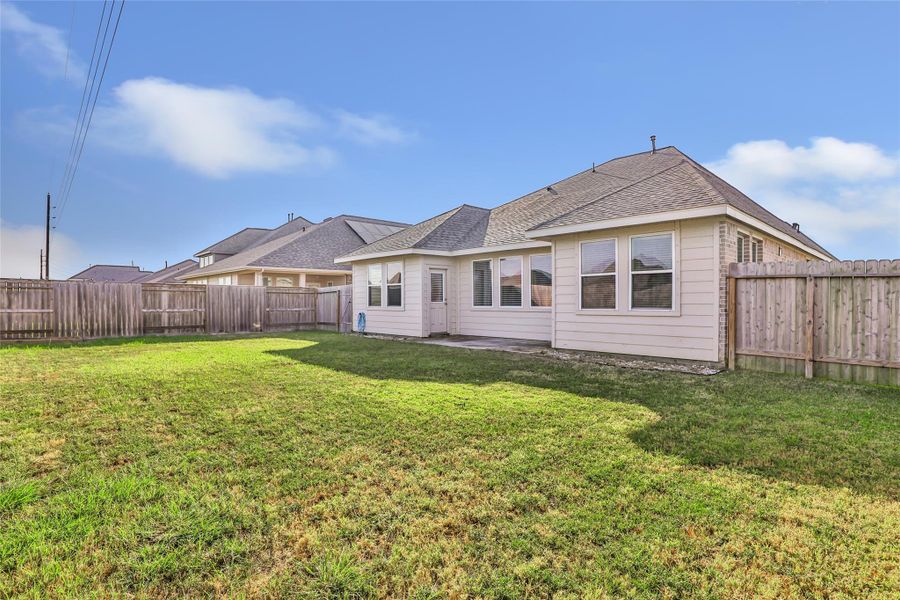 Exterior details and patio area of a home in , Baytown (Image 21). Exterior details and patio area of a home in , Baytown (Image 21).