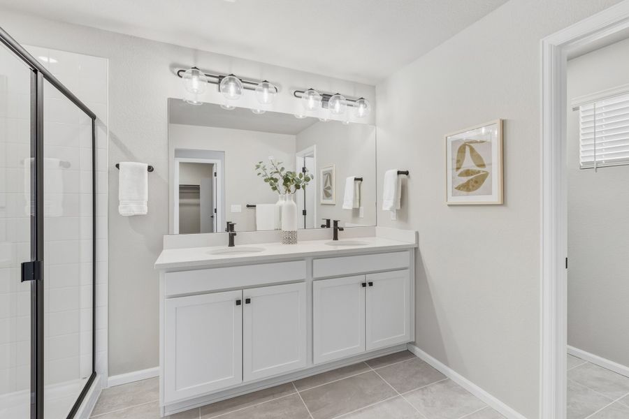 Furnished interior view inside a new home in Woodrose at Painted Prairie, Aurora (Image 12).